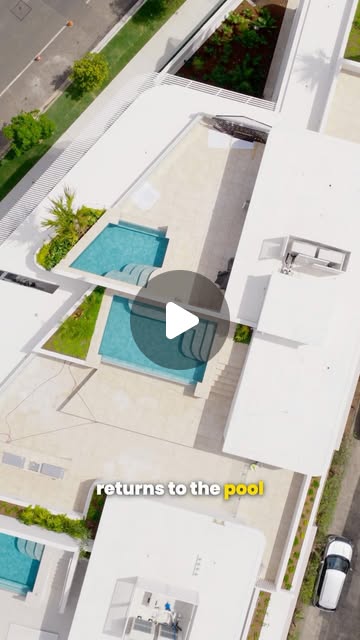 An aerial view of completed white architectural pools, from a Nature Pools Instagram reel